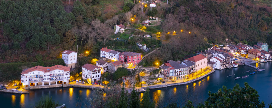 Lights in the port of Pasai Donibane at dusk, Basque Country