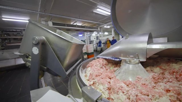 cutter or Mincer for meat processing in the food industry for meat plant.