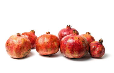 Pomegranates on the white background
