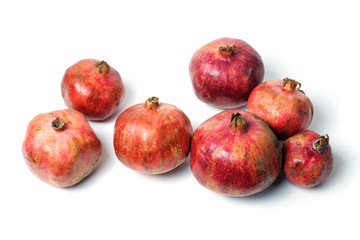 Fototapeta na wymiar Pomegranates on the white background