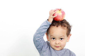 Fototapeta premium a little boy with apple