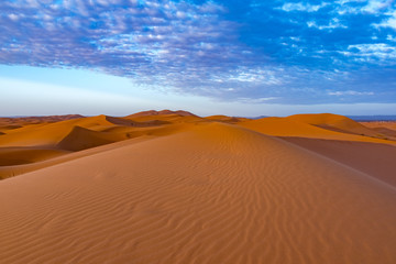 Fototapeta na wymiar Beautiful colorful sunset in Erg Chebbi Dunes, Sahara Desert, Merzouga, Morocco, Africa