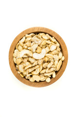 Pile of raw unroasted cashew halves and pieces