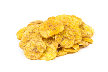 Pile of crunchy sliced dehydrated plaintain fruit chips