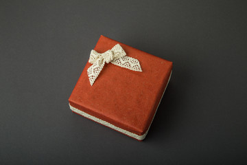 Gift box on a dark background. Top view with place for text.