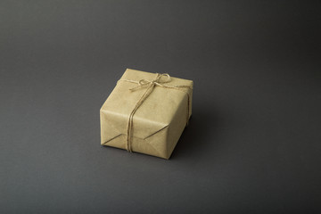 Gift box on a dark background. Top view with place for text.