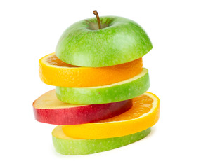 Fototapeta na wymiar Fresh fruits. Stack of apple and orange slices on white