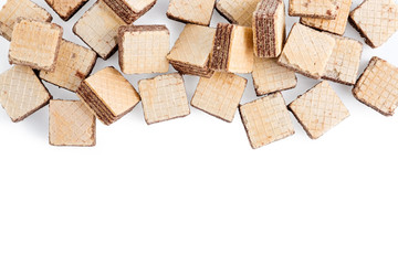heap square wafer biscuits isolated on white