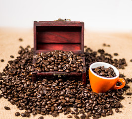 Brown roasted coffee beans, seed on dark background. Espresso dark, aroma, black caffeine drink. Closeup isolated energy mocha, cappuccino ingredient.