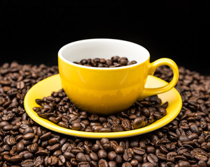 Brown roasted coffee beans, seed on dark background. Espresso dark, aroma, black caffeine drink. Closeup isolated energy mocha, cappuccino ingredient.