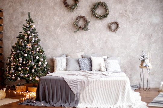 Christmas decorated bedroom interior. Cozy home moment. Concept Happy New Year