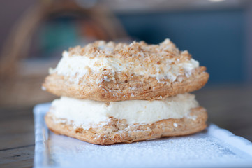 Mille-feuille is known vanilla or custard slice on white plate