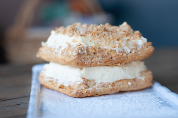 Mille-feuille is known vanilla or custard slice on white plate