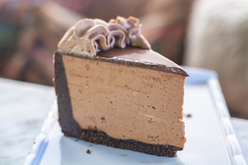 Mocha cheesecake with chocolate and coffee whipped cream on top