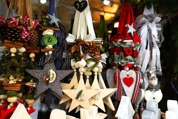 Wooden multi-colored Christmas toys for decorating house at Christmas Market. Wroclaw xmas market...