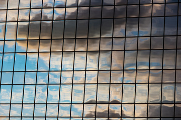 Clouds and sky reflecting off skyscraper windows