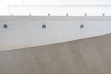 Detail of the interior of a modernist construction with white cement.