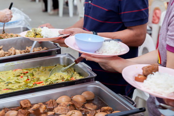 Food Buffet Catering Dining Eating Party Sharing Concept.people group catering buffet food indoor in luxury restaurant with meat colorful fruits and vegetables