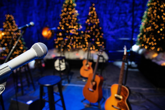 Microphone and guitars on stage during Christmas Holiday show