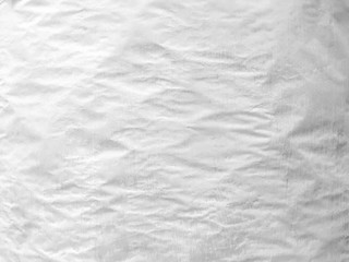 Vintage background form dirty crumpled white paper.