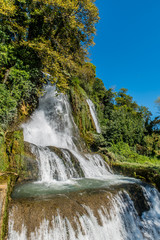 Fototapeta na wymiar Waterfall in the park of the city of Edessa, the largest in Greece
