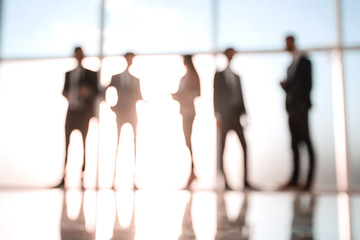 Silhouettes of Business People in Office. Mixed media .