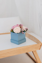 Beautiful spring bouquet with tender flowers in box
