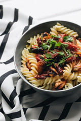 Delicious pasta with tomatoes, mussels and herbs