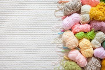 Colored balls of yarn. View from above. Rainbow colors. All colors. Yarn for knitting. Skeins of yarn.