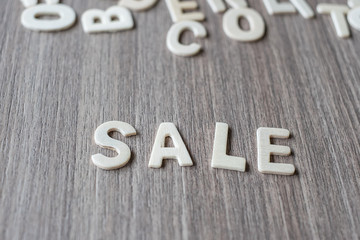 SALE word of wooden alphabet letters. Business and Idea concept