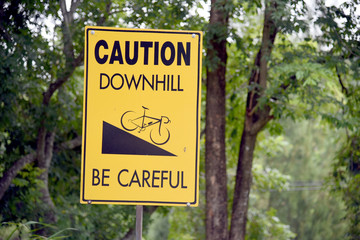 Downhill bike sign. Caution Downhill. Be Careful.