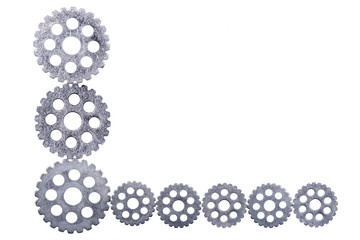 Old vintage antique hour metal gears, cogwheels isolated on white background