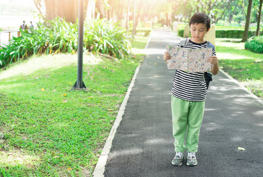 Asian children see map for travelers.