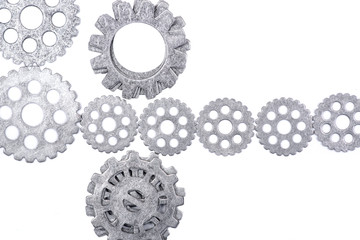 Old vintage antique hour metal gears, cogwheels isolated on white background