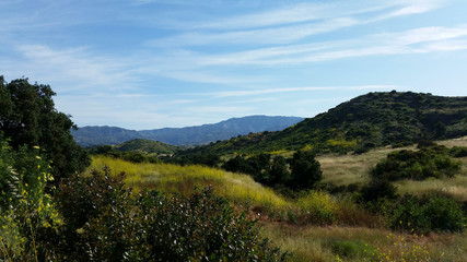 Fototapeta na wymiar Hiking through the hills of Irvine Open Space Park in Orange County California