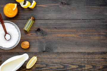 citrus orange cosmetic for natural spa bath on rustic table background top view mock up