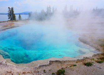 View of turquoise water pools in the West Thumb Geyser Basin in Yellowstone National Park, United States