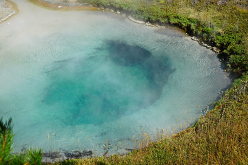View of turquoise water pools in the West Thumb Geyser Basin in Yellowstone National Park, United States