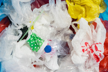 Many waste plastics in the trash bin