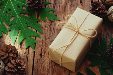 Eco friendly gift boxes wrapped with brown paper, green happy new year present concept