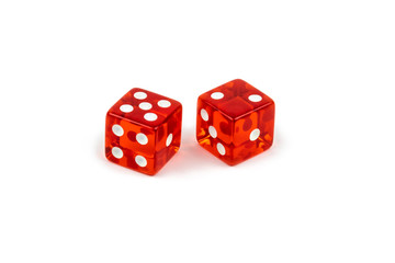 Two red glass dice isolated on white background. Five and two.