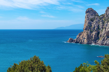 Mount and Cape Karaul-Oba in Crimea. Beautiful view of the sea, mountains and trees. - obrazy, fototapety, plakaty