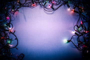 colorful pink, green and blue holiday lights Christmas background