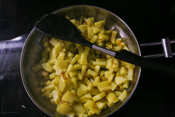 Fried potatoes with sausages