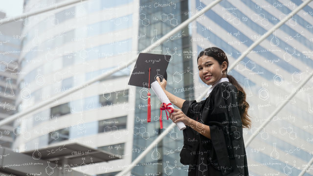 Asian woman having graduation with overlay of chemistry formalar - Powered by Adobe