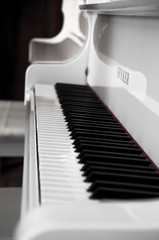 White piano and keys