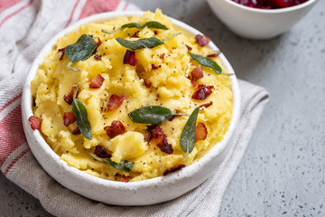 Mashed potatoes with crispy bacon and sage