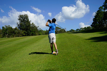 Golfer playing golf in beautiful golf course in the evening golf course with sunshine in thailand