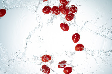 Cherry tomatos water splash