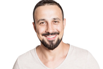 Obraz premium Cute laughing young male with beard isolated on white background